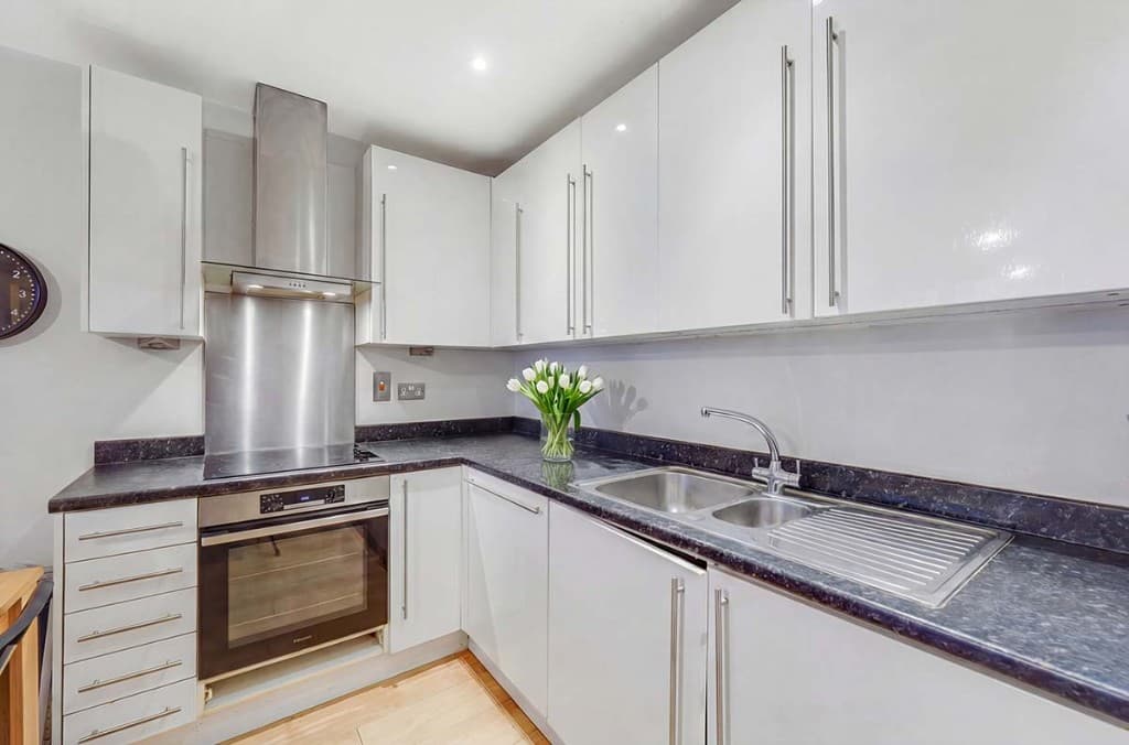 The same kitchen with worktops cleared and tidied by PhotoClear
