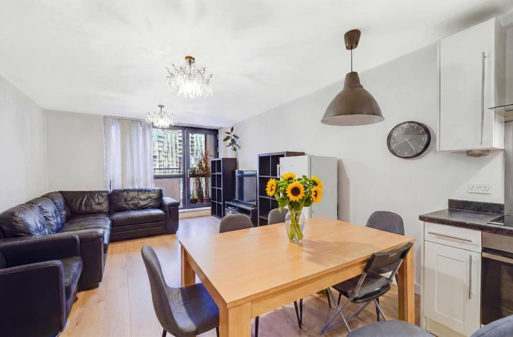 The same living and dining room cleared of clutter by PhotoClear